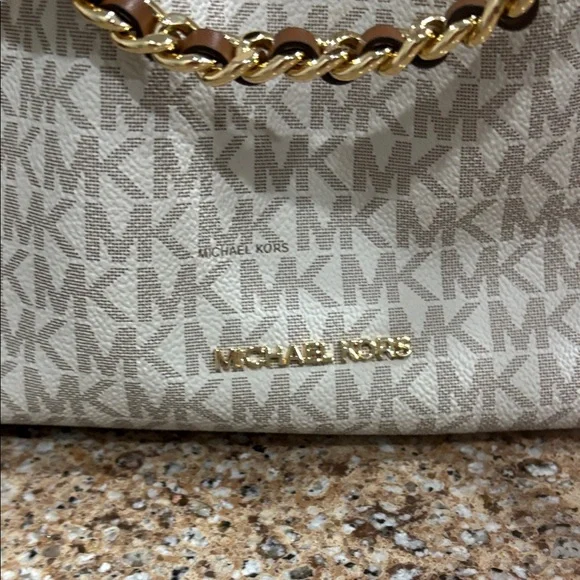 Like new Michael Kors Tan and Brown crossbody bag